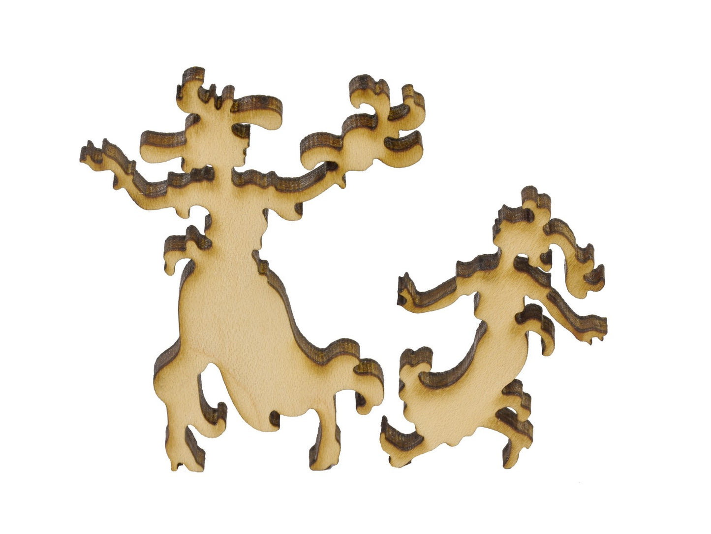 A closeup of pieces in the shape of a woman and a girl.