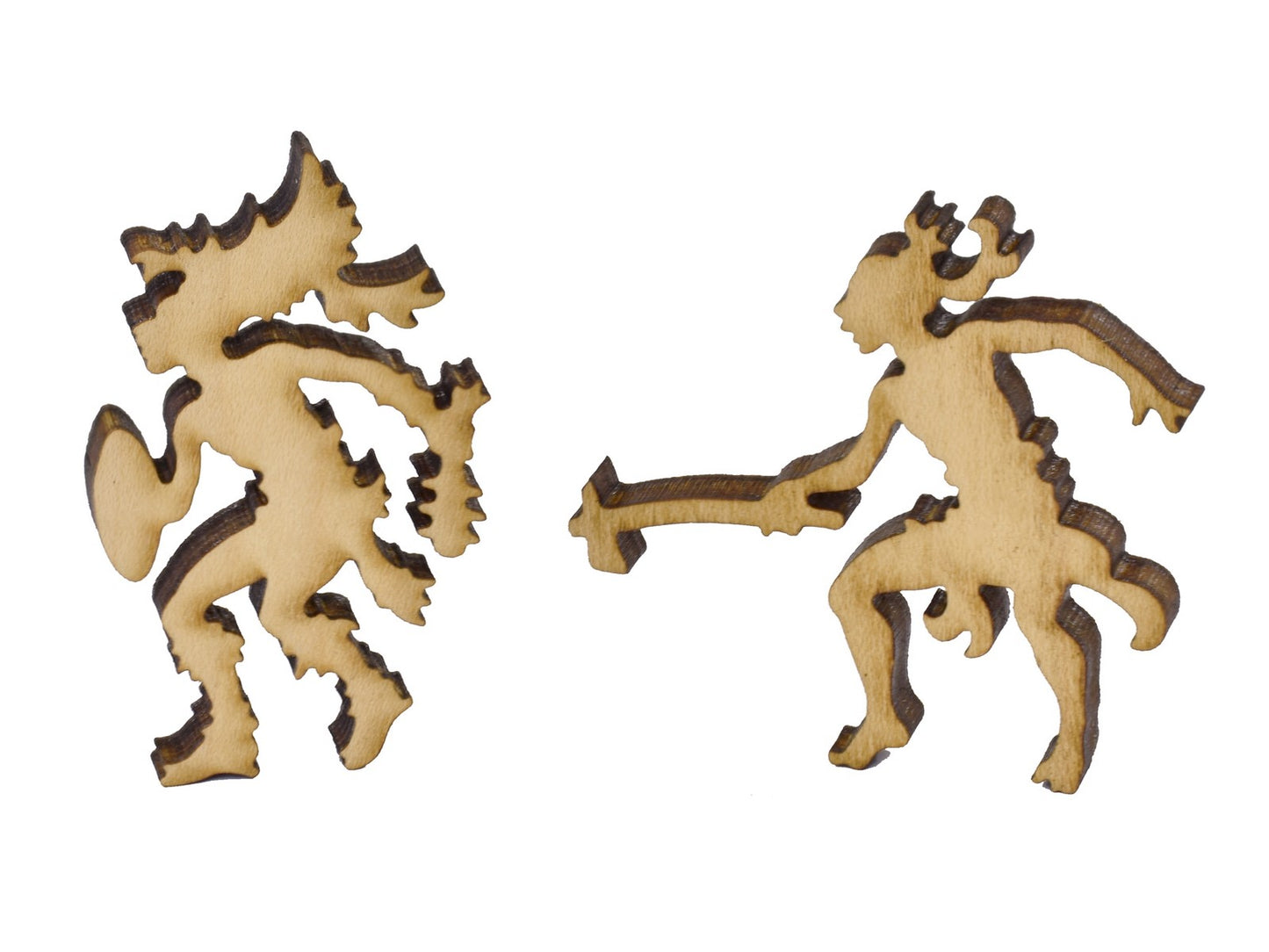 A closeup of pieces in the shape of two warriors.