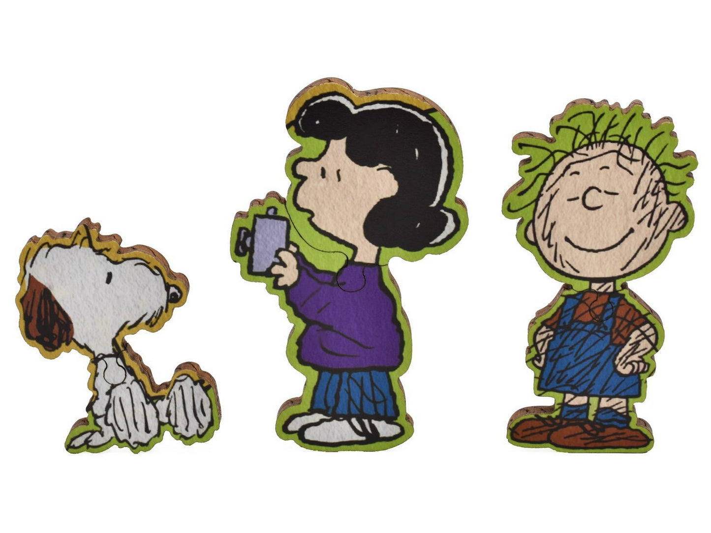 A closeup of pieces in the shape of Andy, Lucy, and Pig Pen.