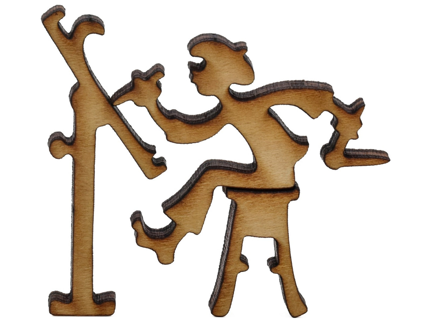 A closeup of pieces shaped like an artist with their easel.