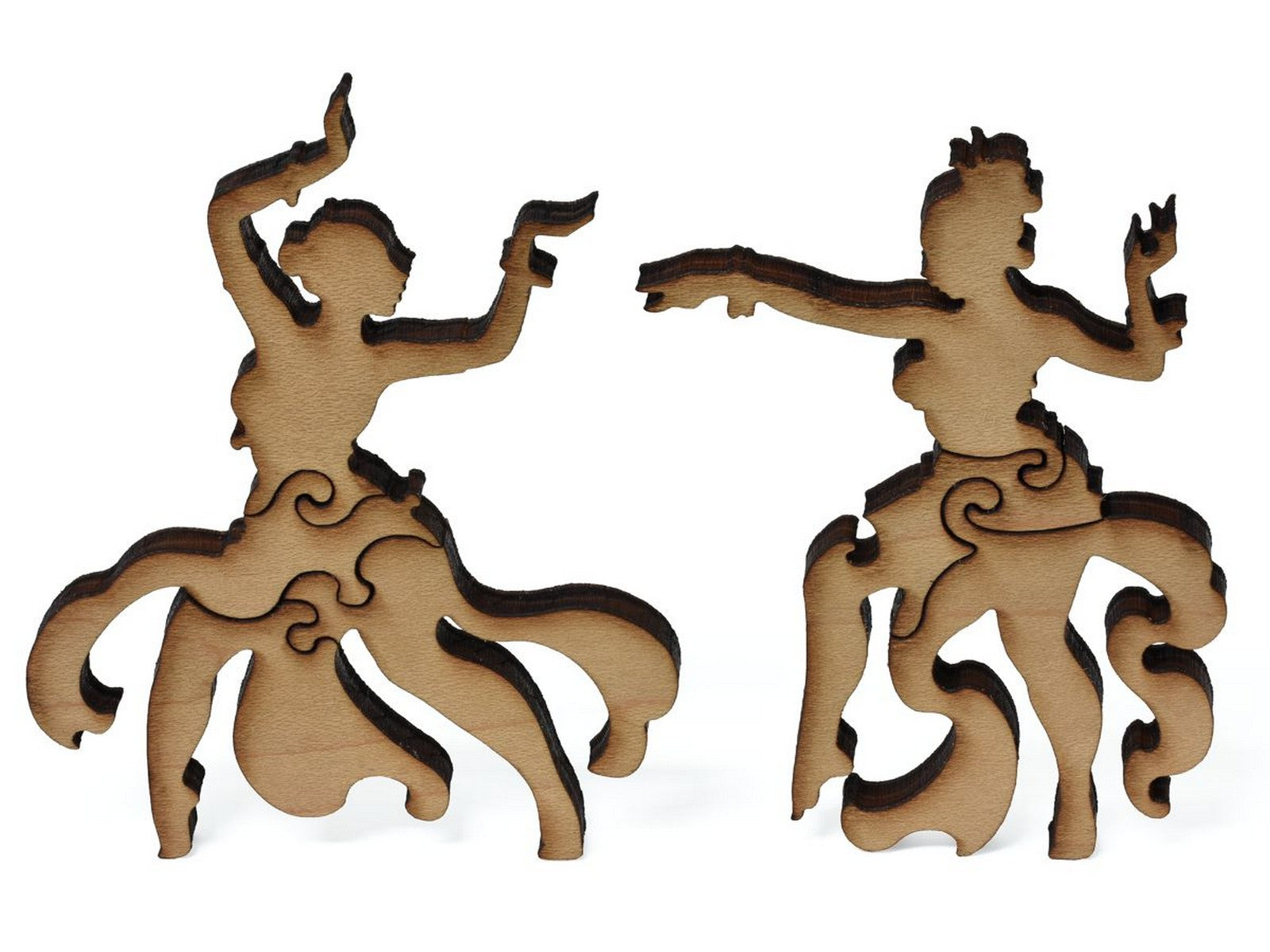A closeup of pieces showing two women dancing.