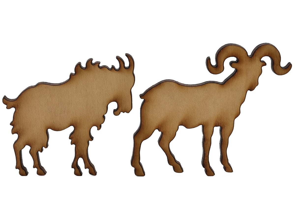 A closeup of pieces shaped like a mountain goat and a big horn sheep.