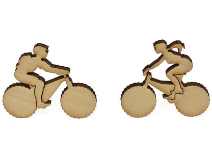 A closeup of pieces showing two people on mountain bikes.