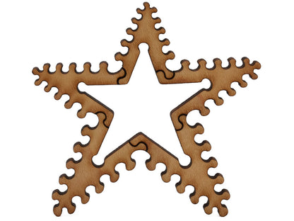 A closeup of pieces shaped like the Boulder star.