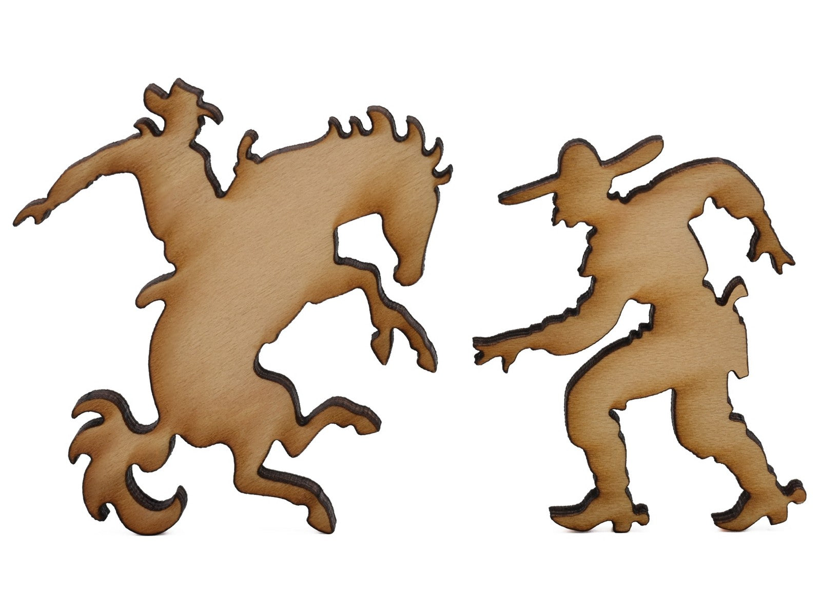 A closeup of pieces shaped like a bucking bronco and a gunslinger.