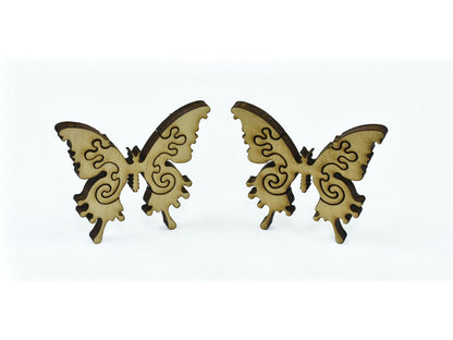 A closeup of pieces in the shape of butterflies.