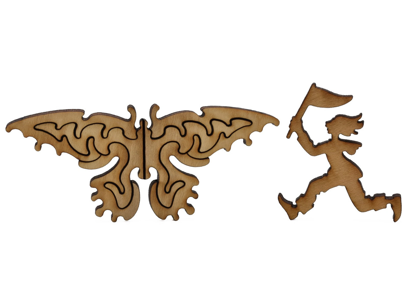 A closeup of pieces shaped like a large butterfly and a person with a butterfly net.