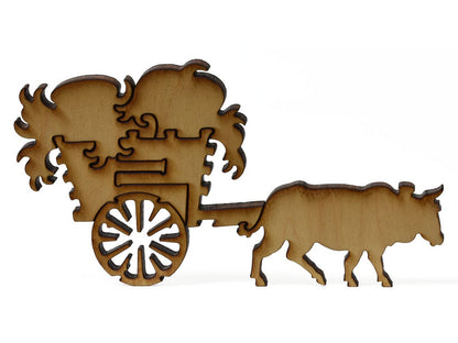 A closeup of pieces showing an ox pulling a cart.