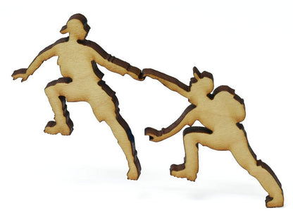A closeup of pieces showing two mountain climbers.