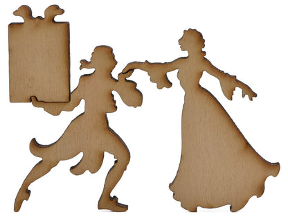 A closeup of pieces shaped like a couple with a large gift.