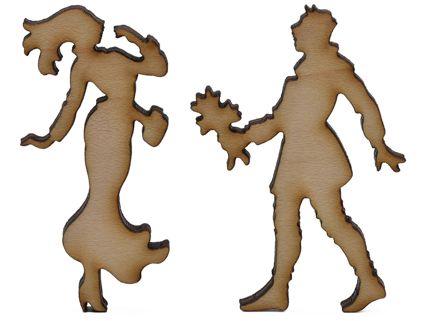 A closeup of pieces shaped like a couple with flowers.