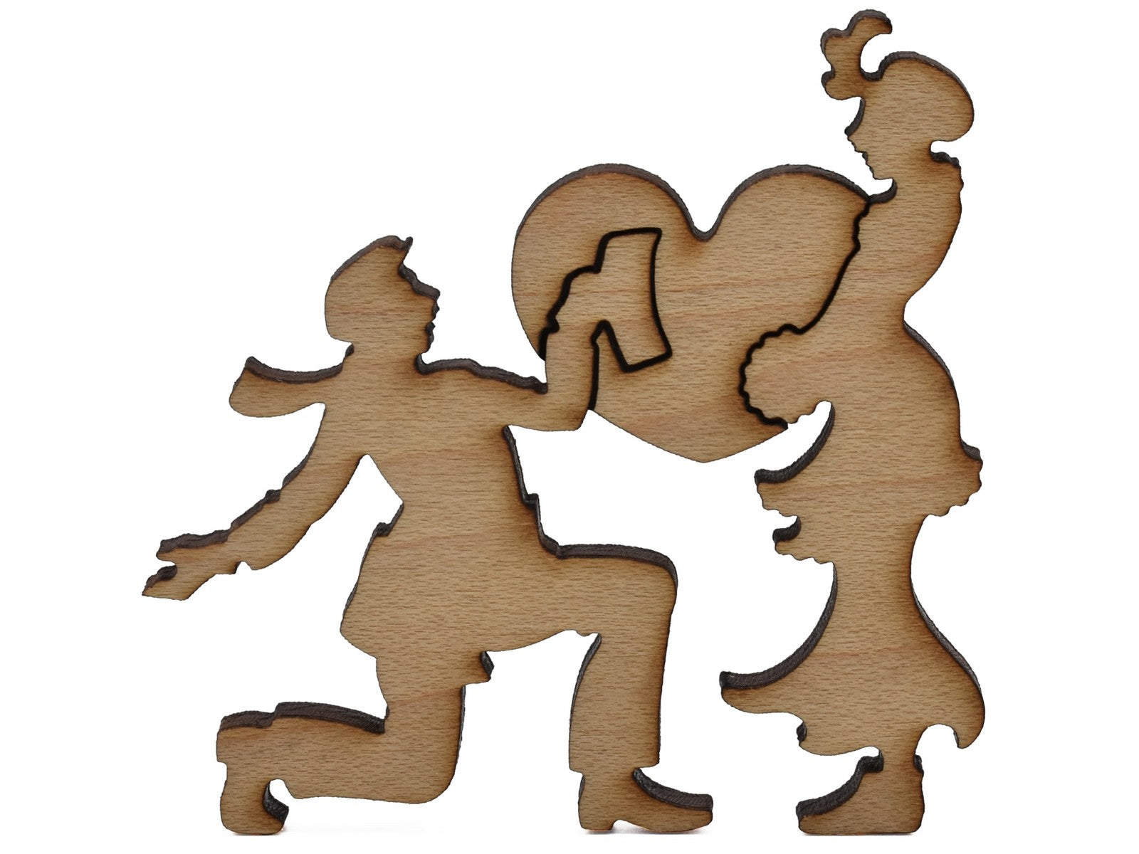 A closeup of pieces shaped like a couple and a big heart.