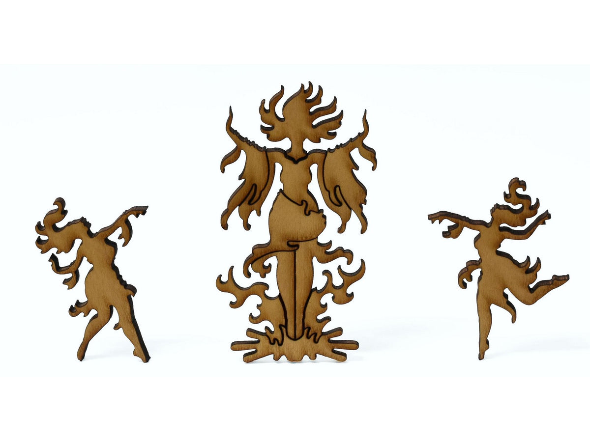 A closeup of pieces shaped like witches dancing around a person in a fire.