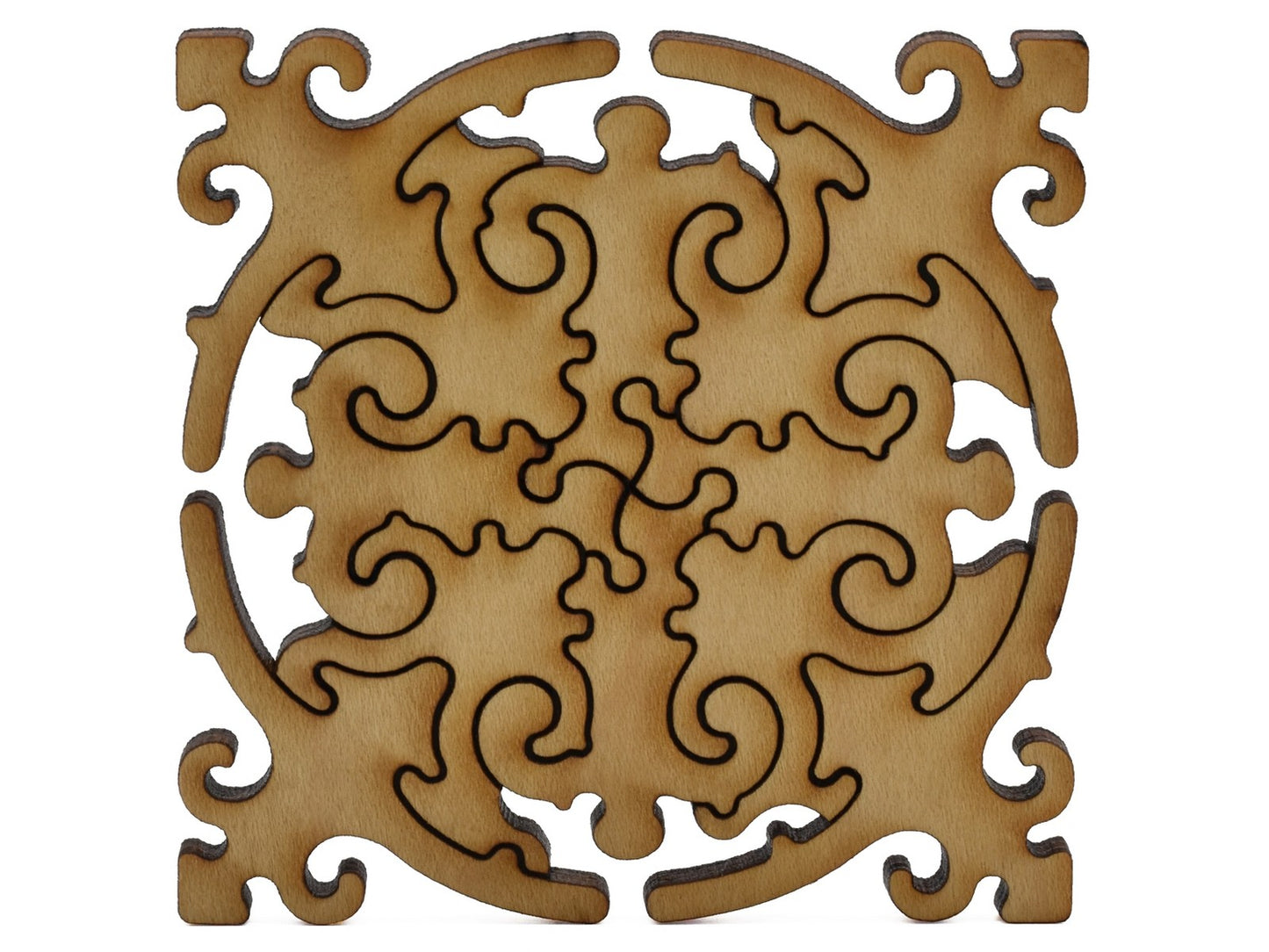 A closeup of pieces shaped like a large multi-piece mandala.