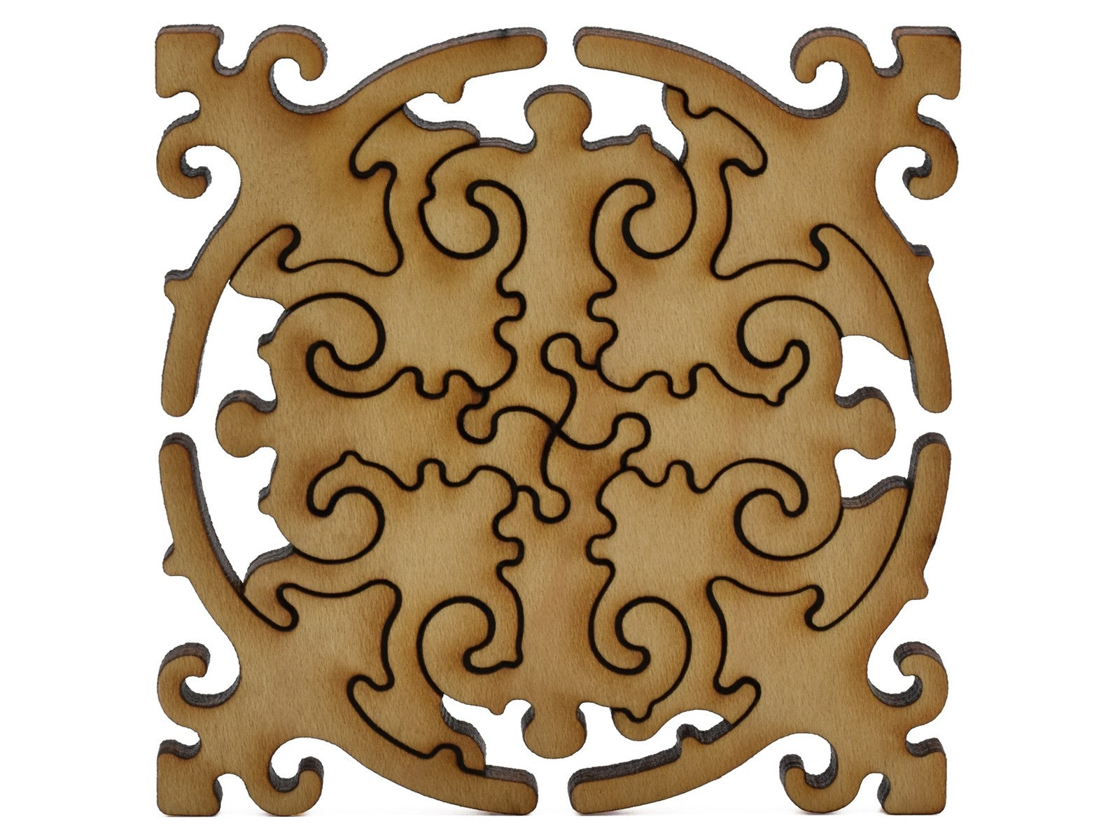 A closeup of pieces shaped like a large multi-piece mandala.