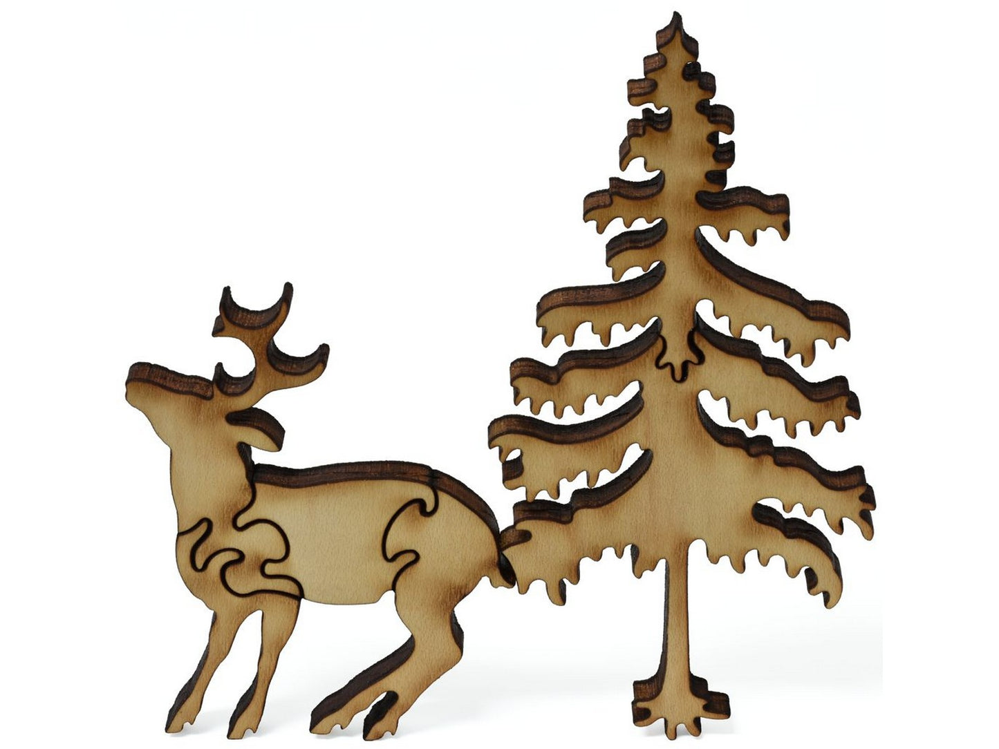 A closeup of pieces showing a deer and a tree.