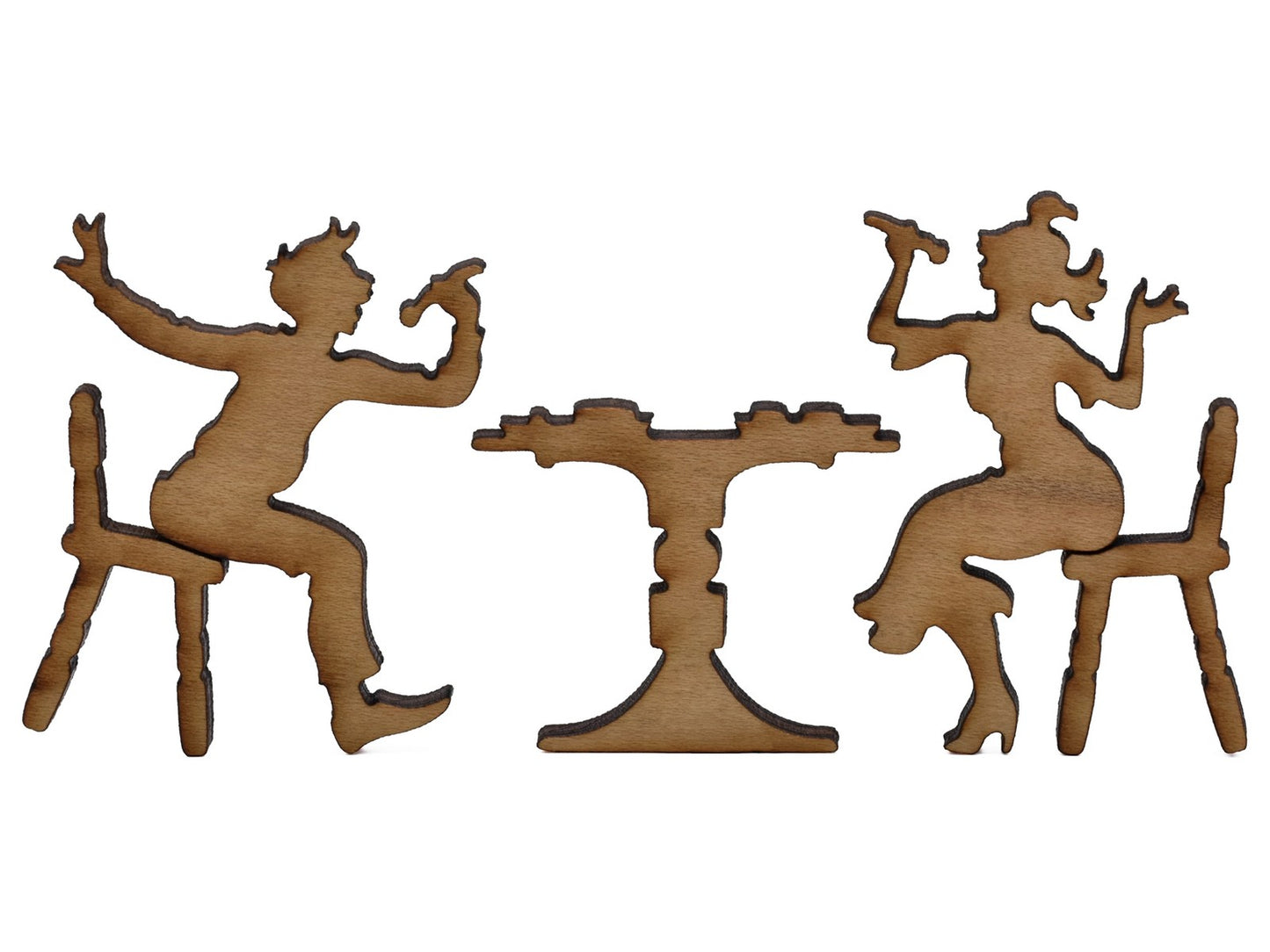 A closeup of pieces shaped like two diners at a table.