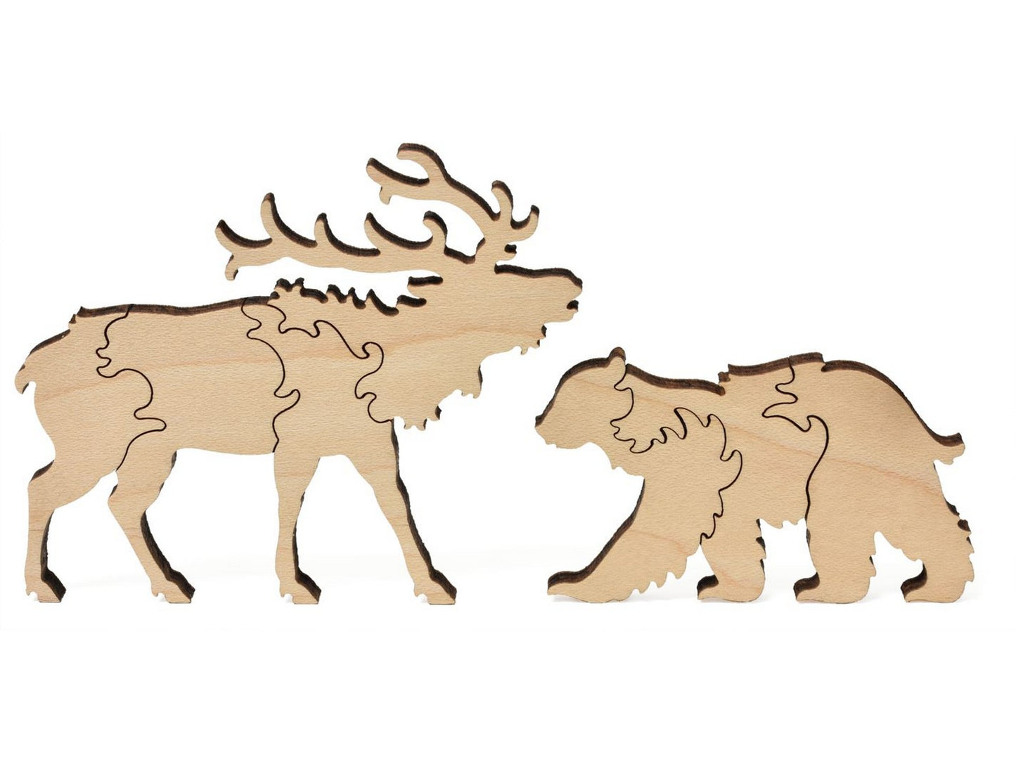 A closeup of pieces showing an elk and a bear from the puzzle, Gothic, Colorado.