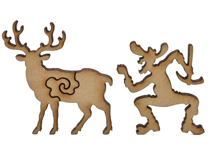 A closeup of pieces shaped like a buck and a miner.