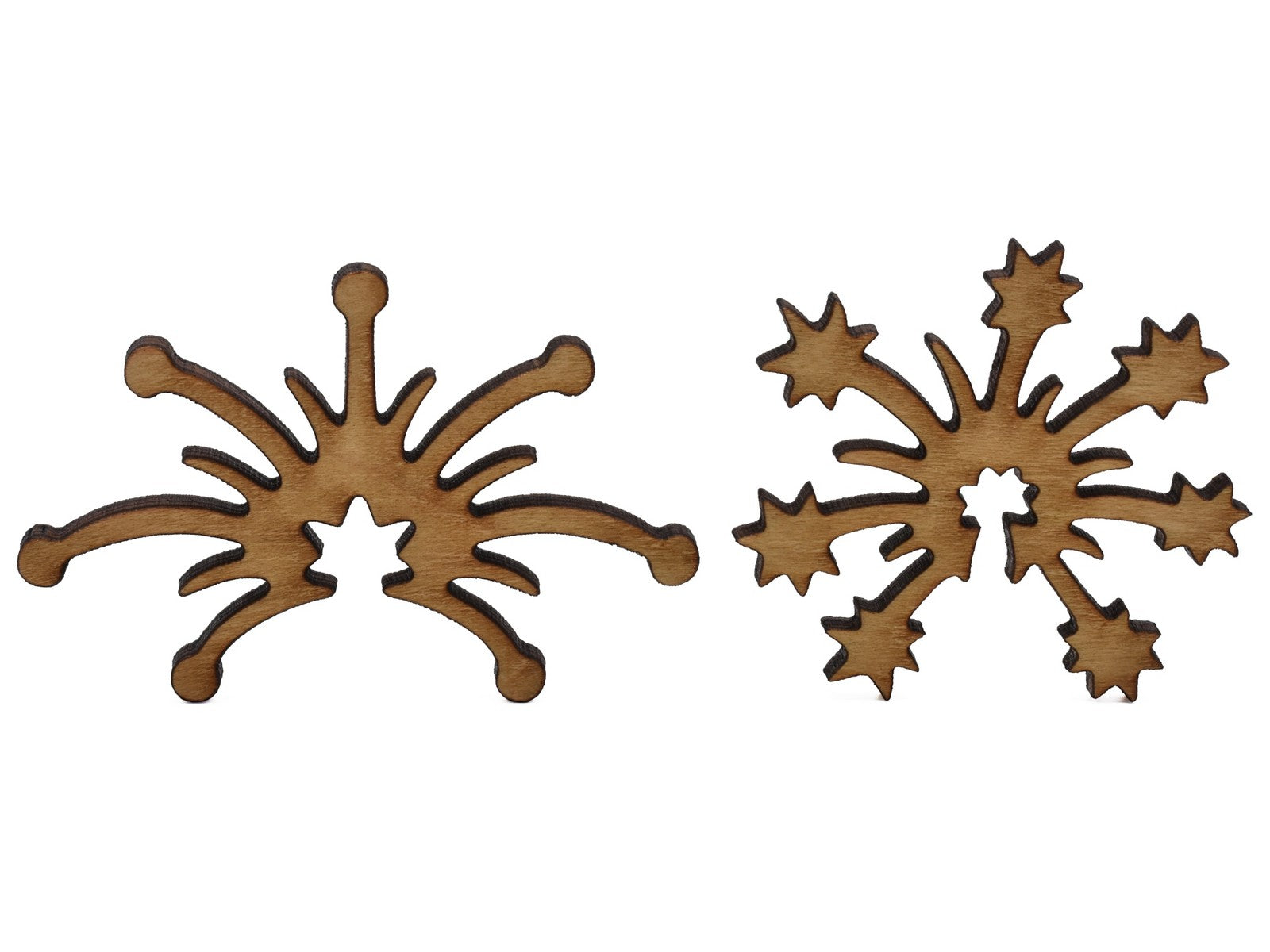 A closeup of pieces shaped like two fireworks exploding.