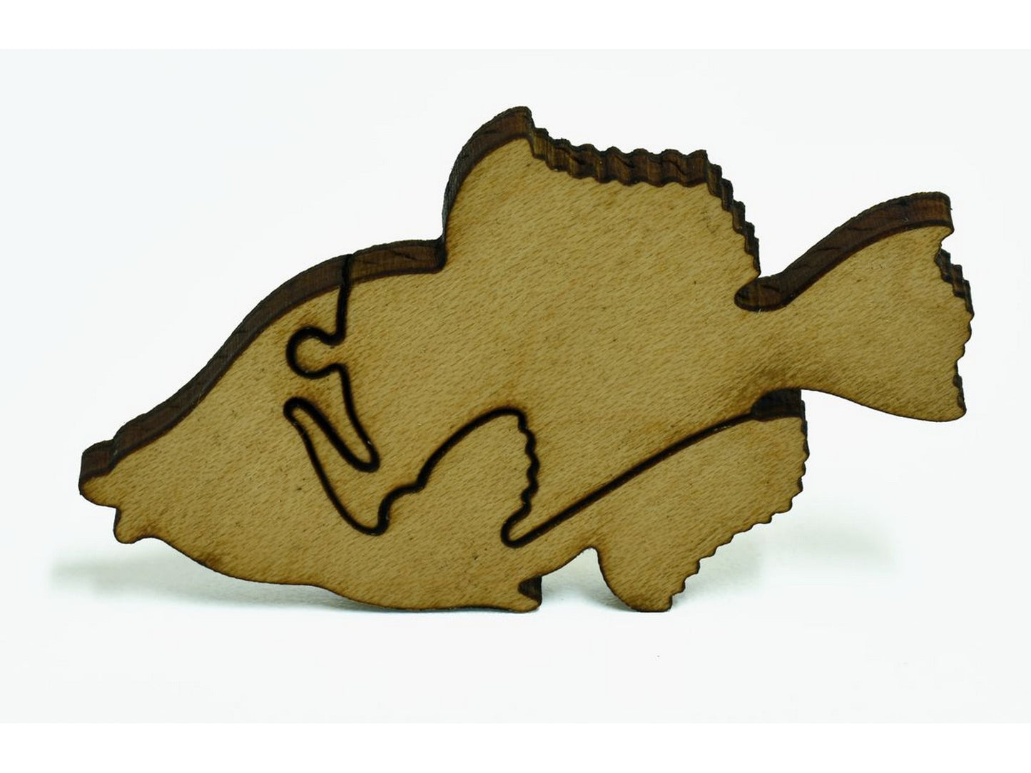 A closeup of pieces shaped like a fish, showing the detail in the pieces.