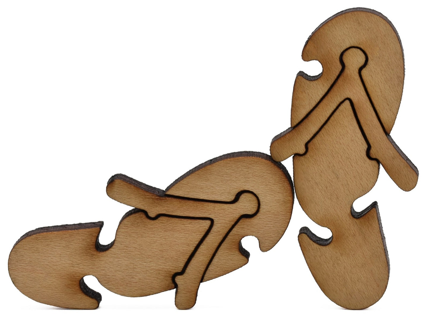 A closeup of pieces shaped like a pair of flip flops.