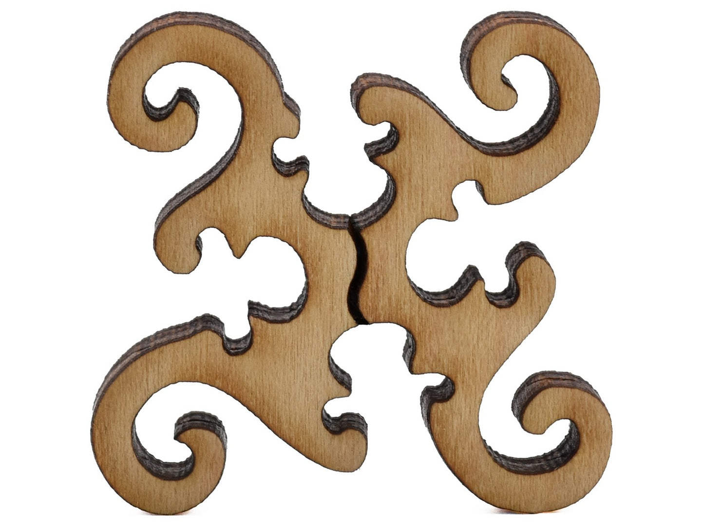 A closeup of pieces shaped like a round geometrical design.