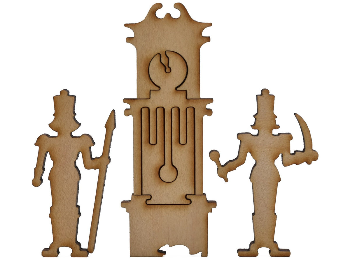 A closeup of pieces shaped like a grandfather clock and two nutcrackers.