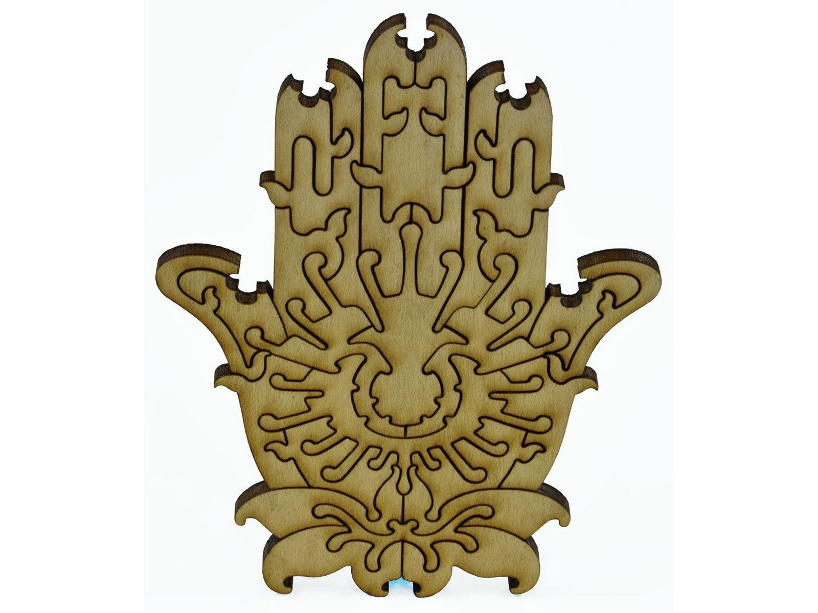 A closeup of pieces that make up a multi-piece hamsa.