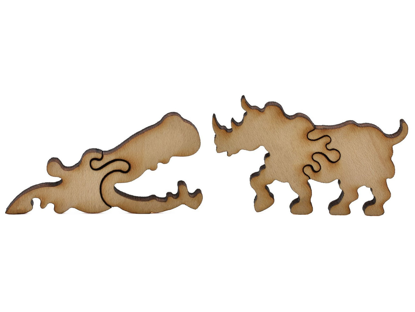 A closeup of pieces shaped like a rhino and a hippo.