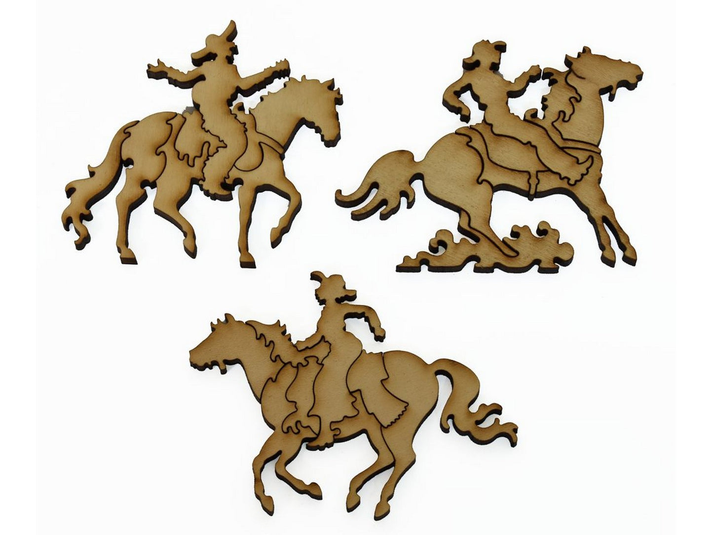 A closeup of pieces showing three multi-piece cowboys on horseback.
