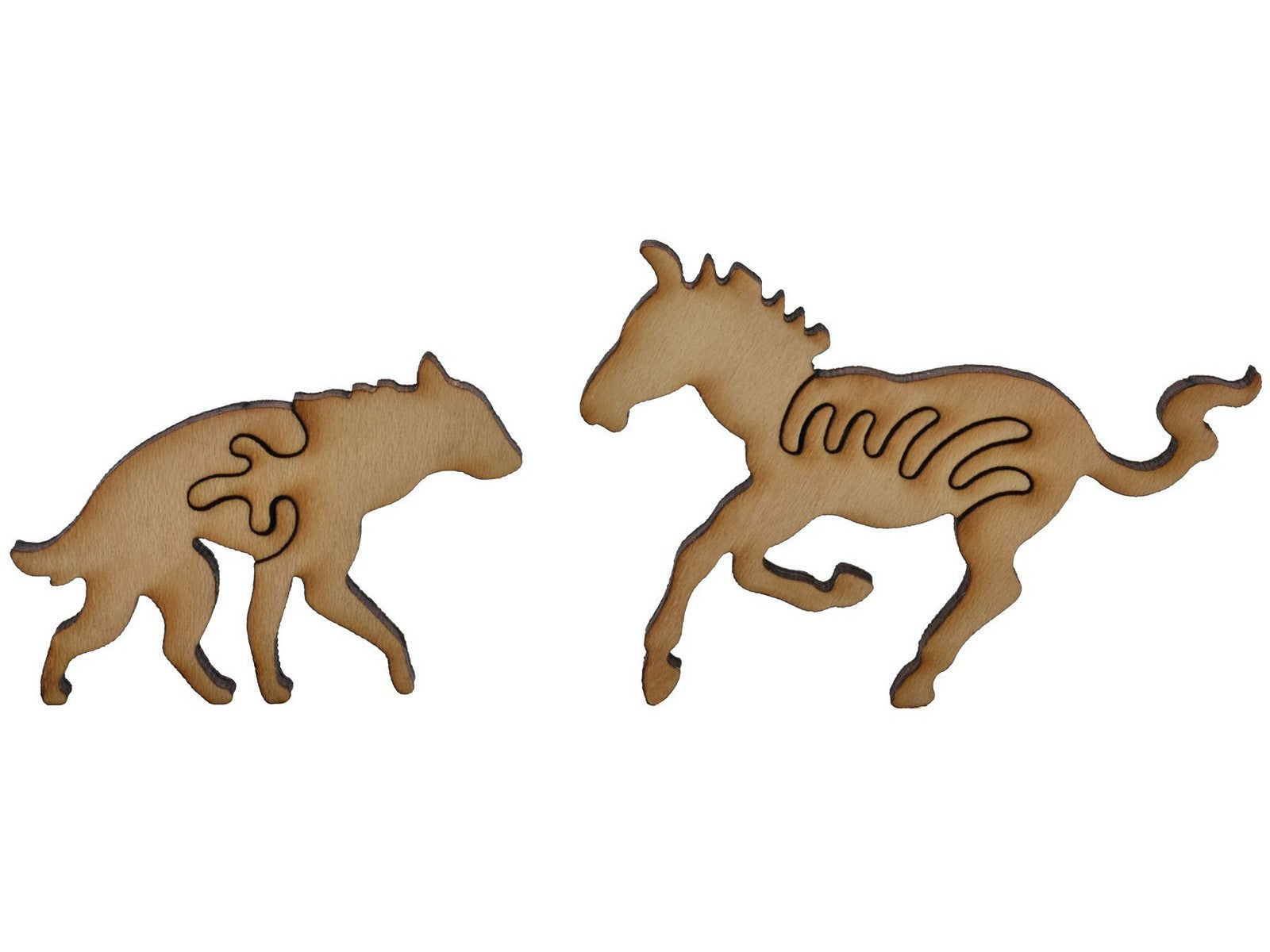 A closeup of pieces shaped like a hyena and a zebra.
