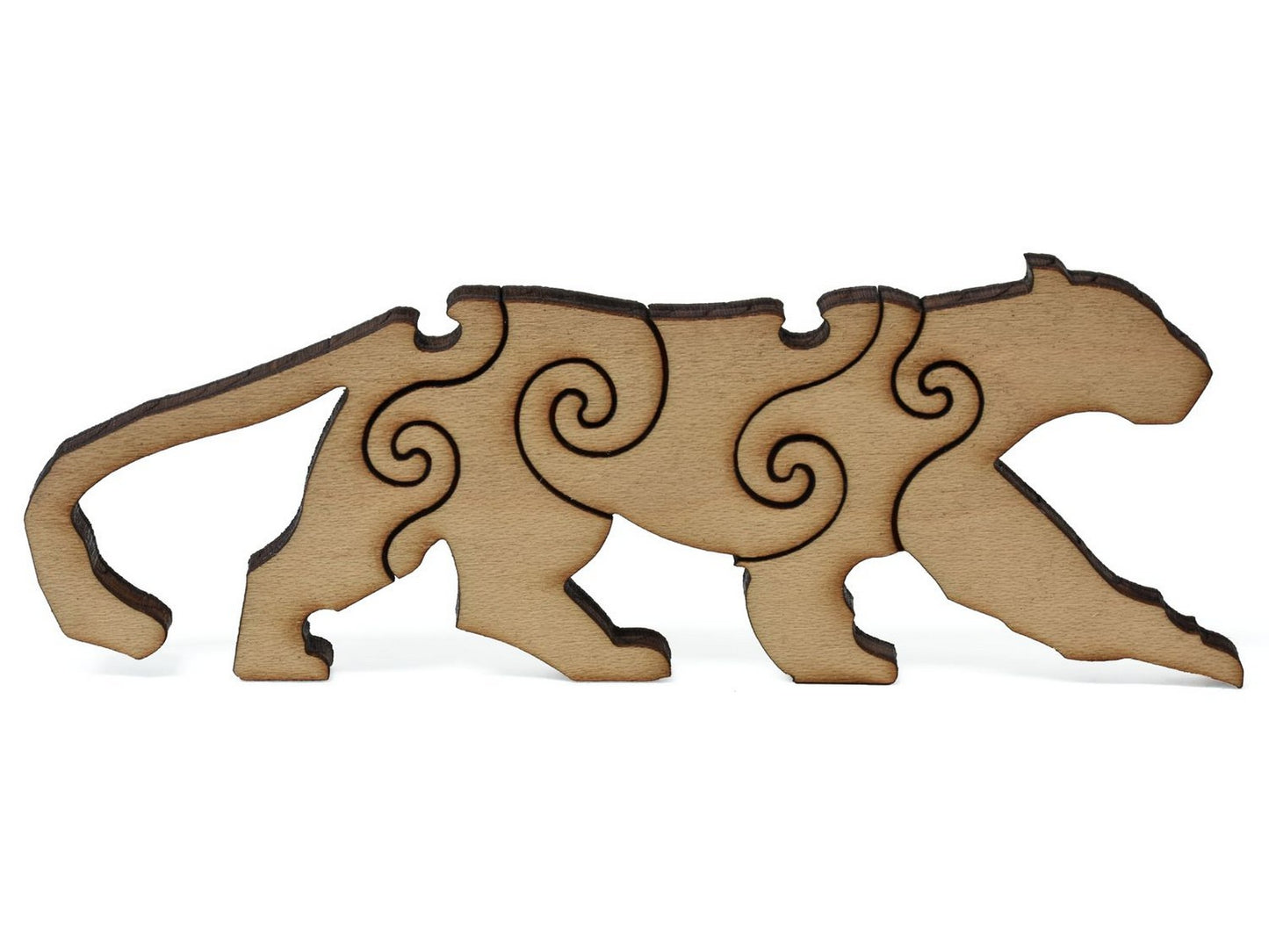 A closeup of pieces shaped like a leopard.