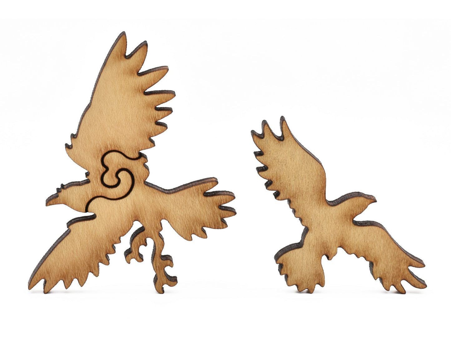 A closeup of pieces showing two birds.
