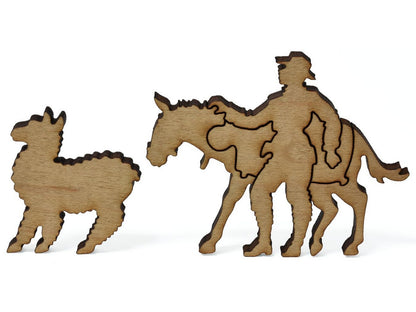 A closeup of pieces showing a man with a donkey and a llama.
