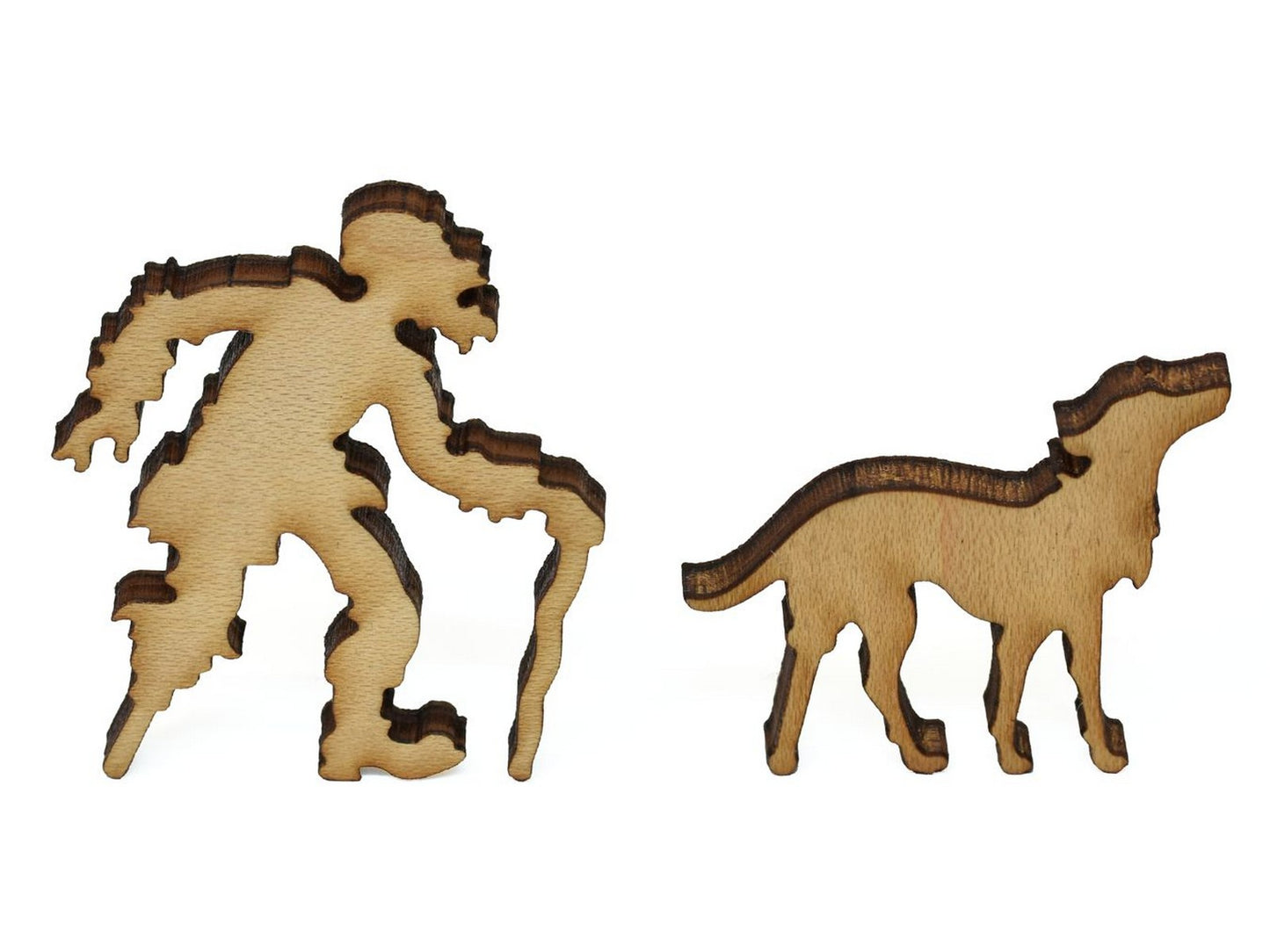 A closeup of pieces showing a man with a peg-leg walking his dog.