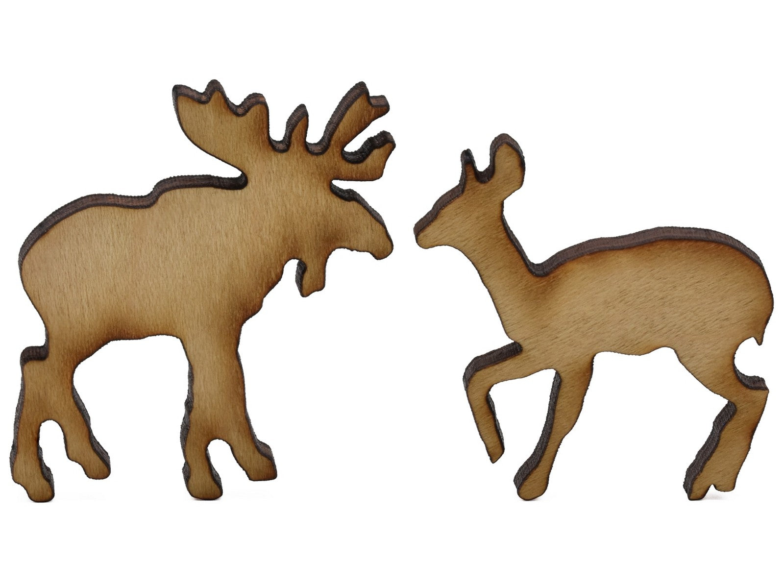 A closeup of pieces shaped like a moose and a deer.