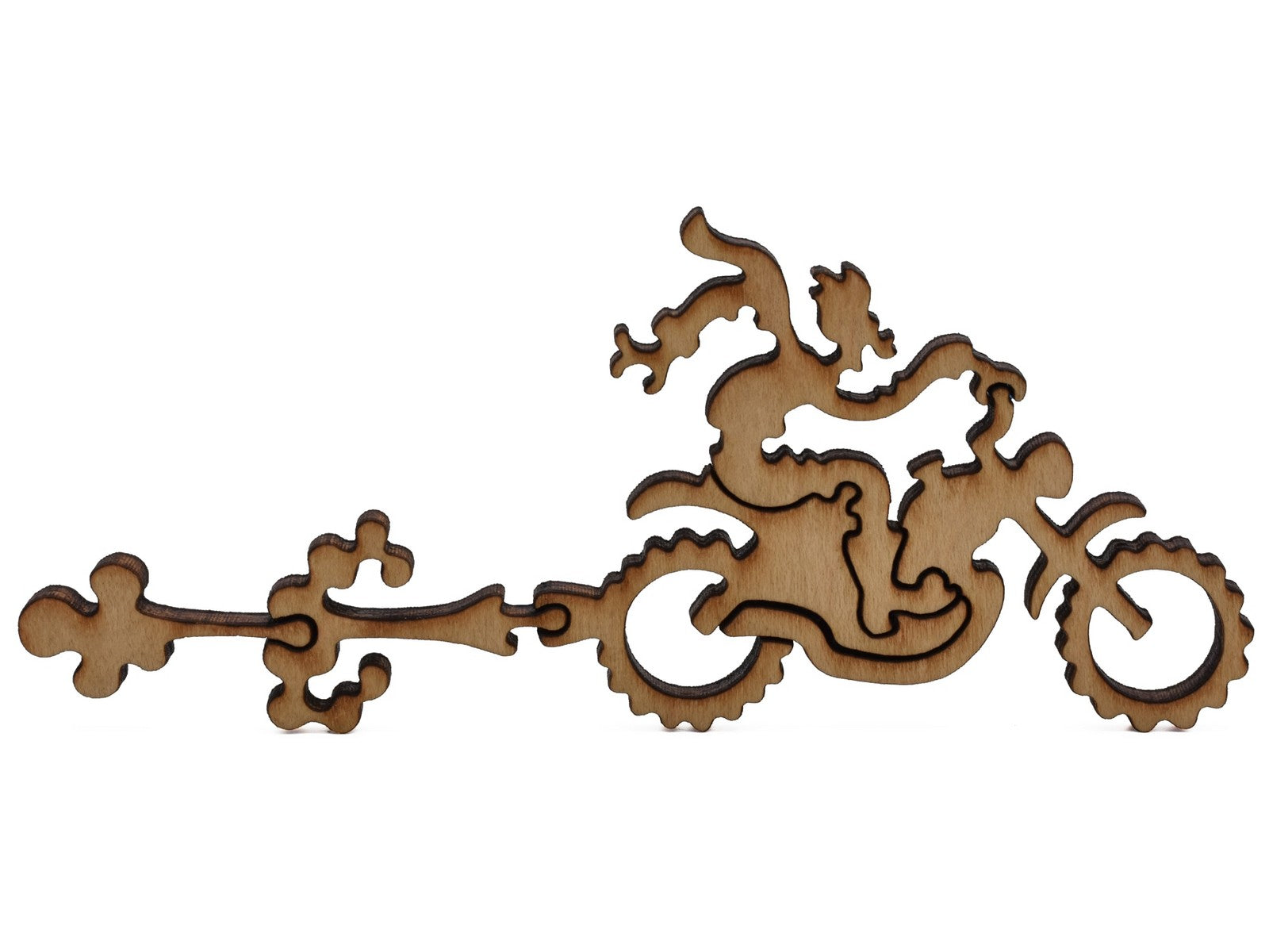 A closeup of pieces shaped like a man riding a motorcycle.