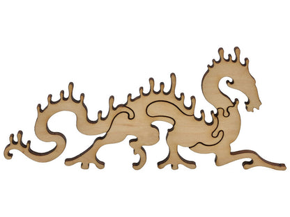 A closeup of pieces in the shape of a multi-piece dragon.