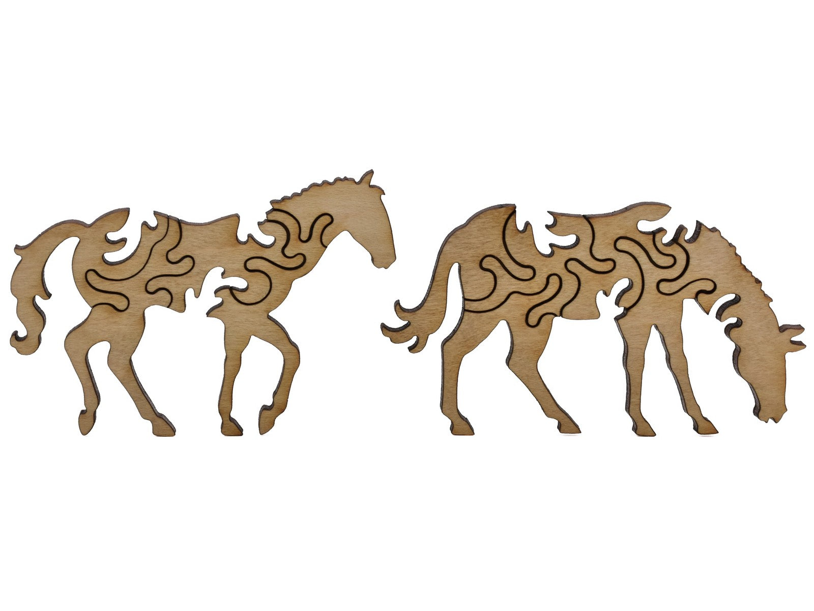 A closeup of pieces shaped like two large horses.