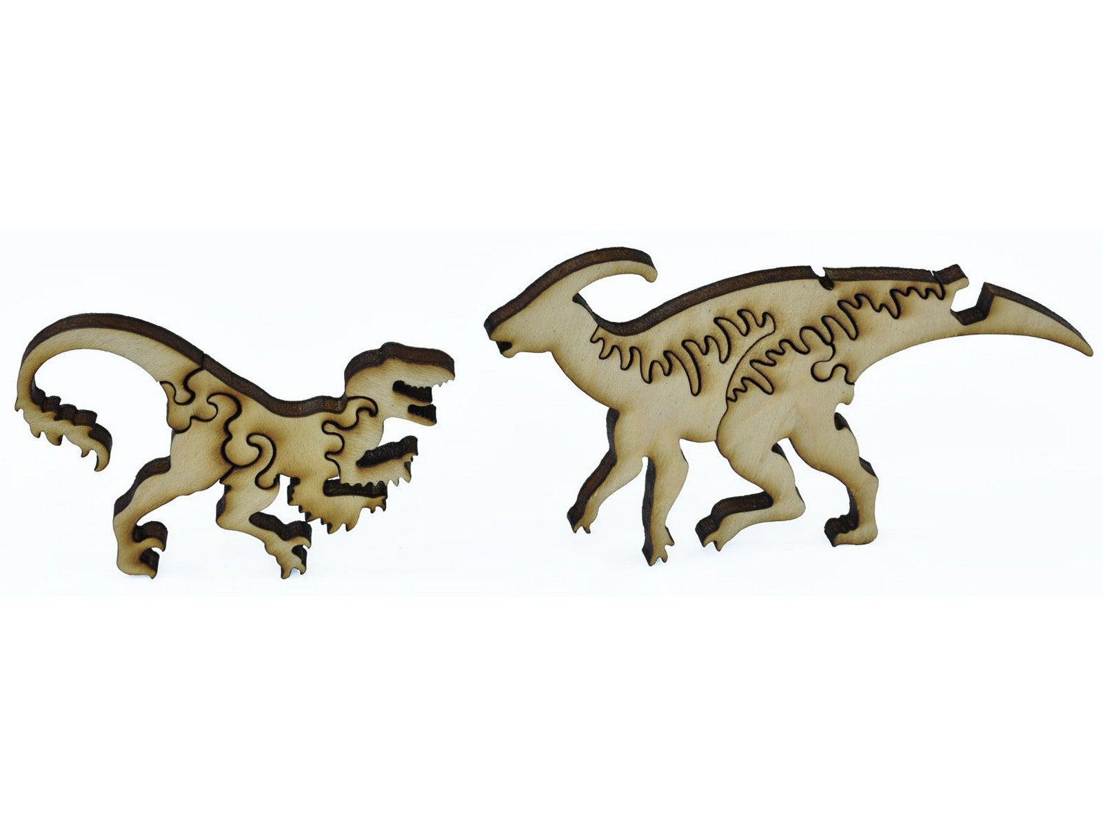 A closeup of pieces shaped like a raptor and a Parasaurolophus.