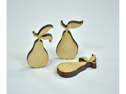 A closeup of pieces in the shape of pears.