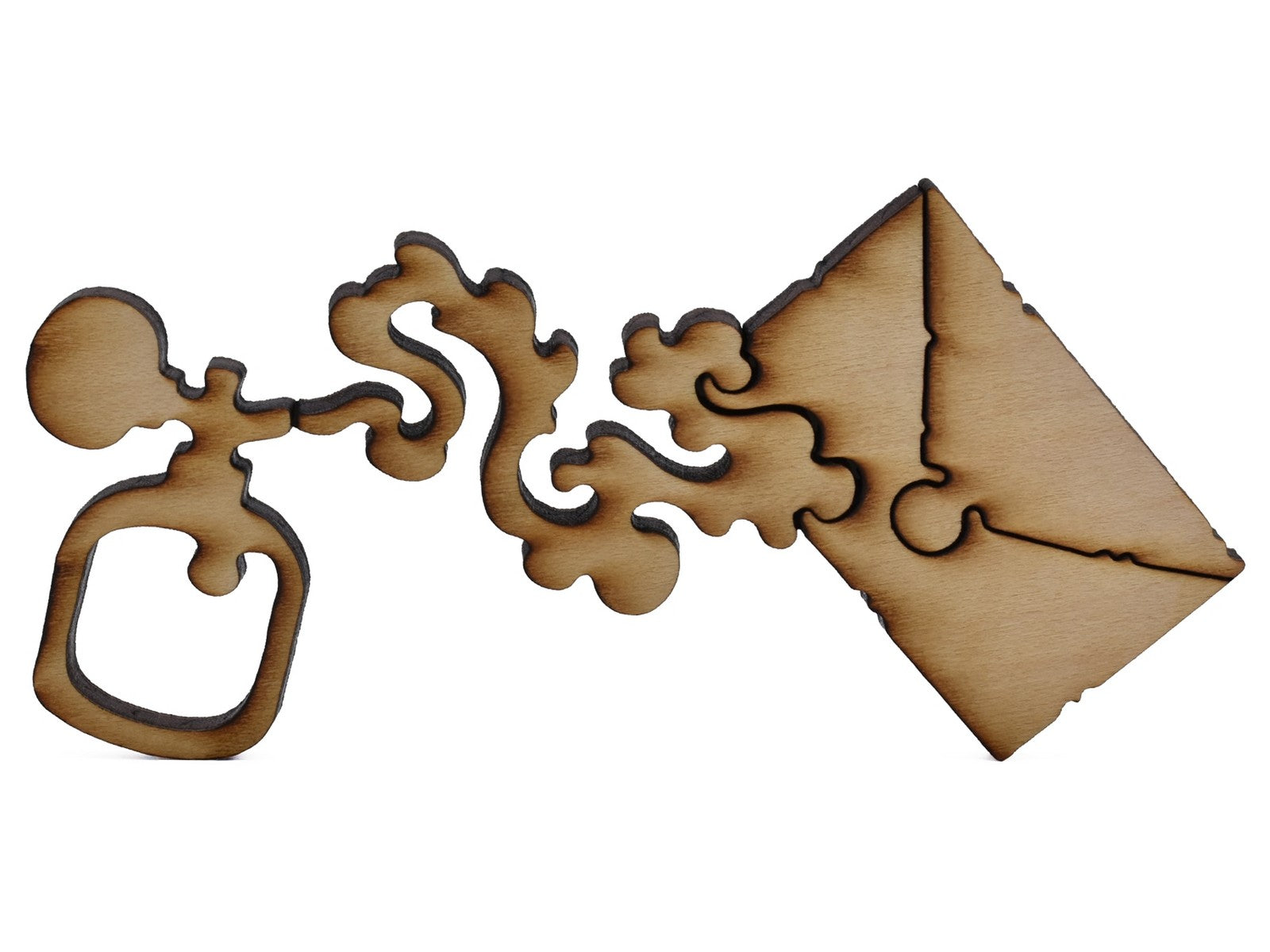 A closeup of pieces shaped like a perfume bottle and a letter.