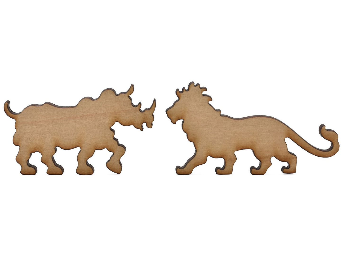 A closeup of pieces shaped like a rhino and a lion.