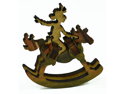 A closeup of pieces in the shape of a 3D rocking horse.