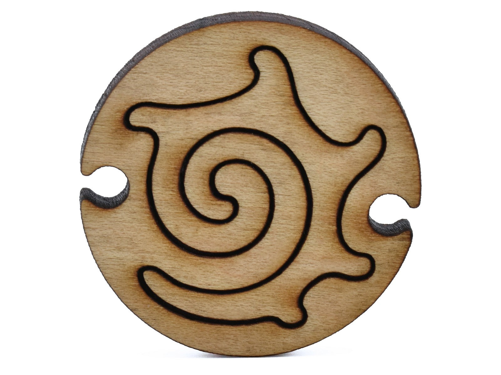 A closeup of pieces shaped like a round nautilus.
