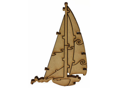 A closeup of pieces showing a multi-piece sailboat.