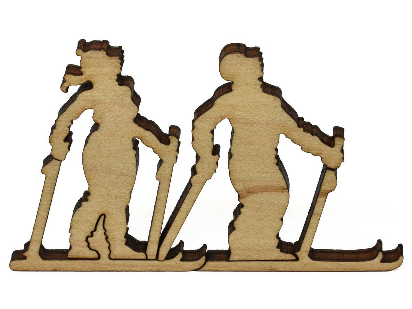A closeup of pieces showing two cross country skiers.