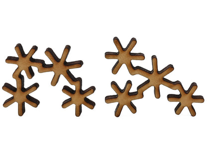 A closeup of pieces shaped like clusters of snowflakes.