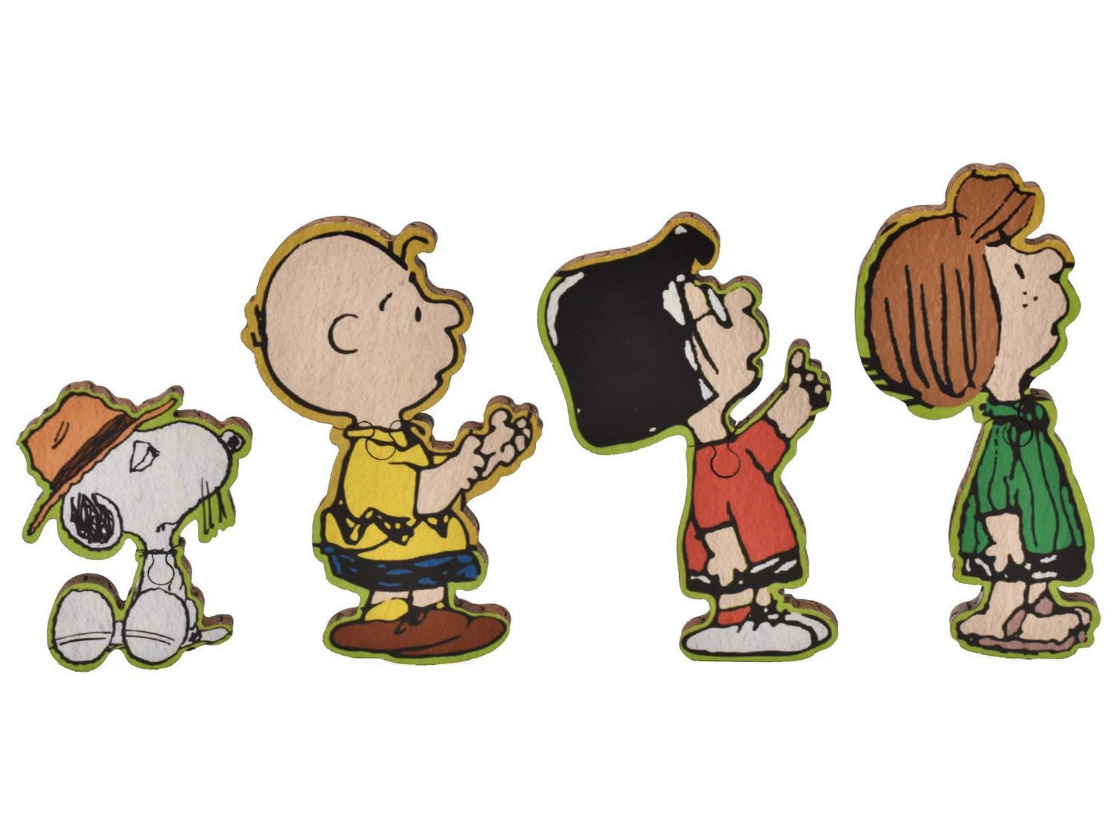 A closeup of pieces in the shape of Spike, Charlie, Marcie, and Peppermint Patty.